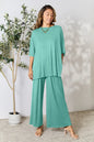 Trendsi hot pink double take full-size round neck slit top and matching pants set, casual stylish outfit.