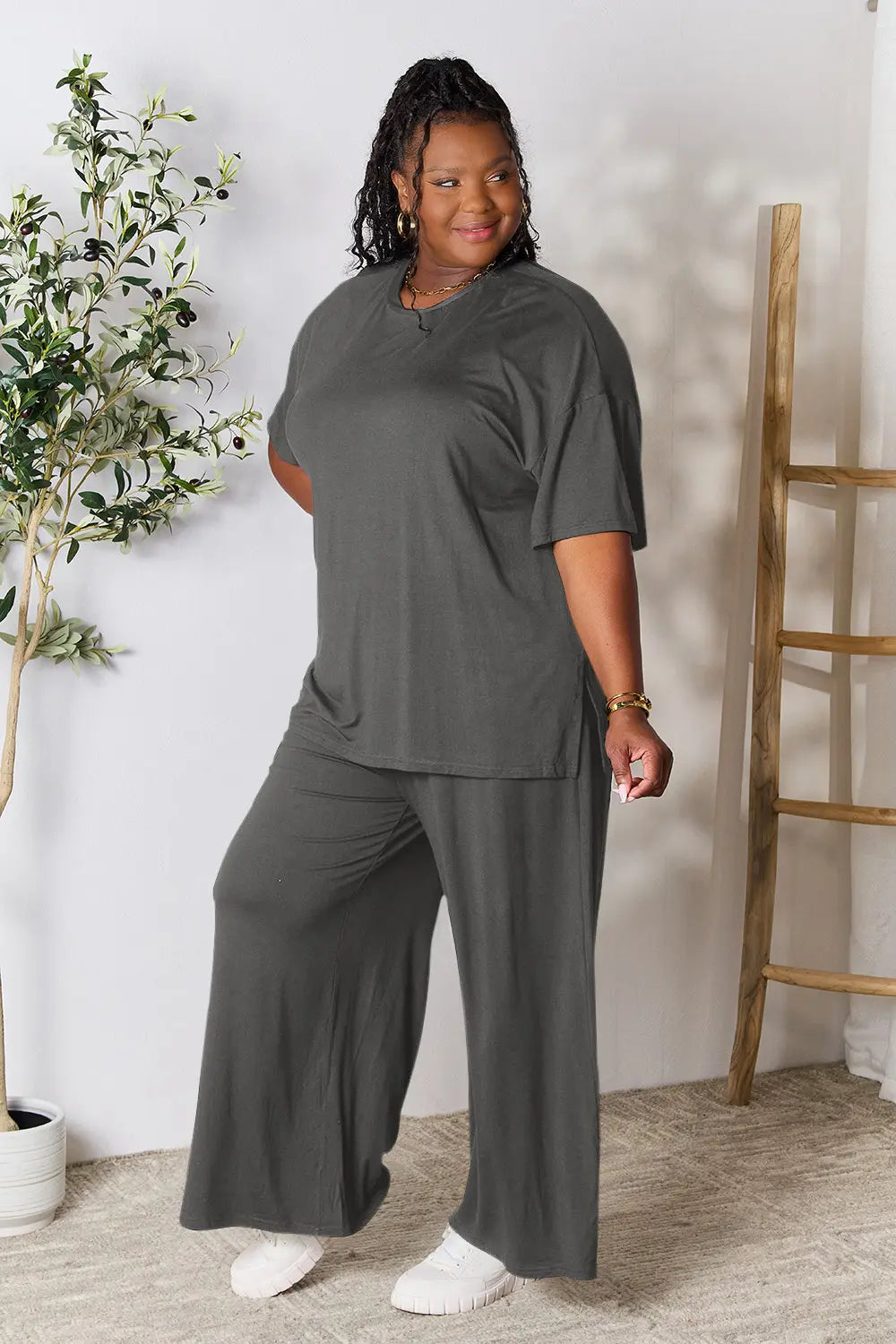 Hot pink double take full size round neck slit top and matching pants set by Trendsi, stylish and comfortable ensemble.
