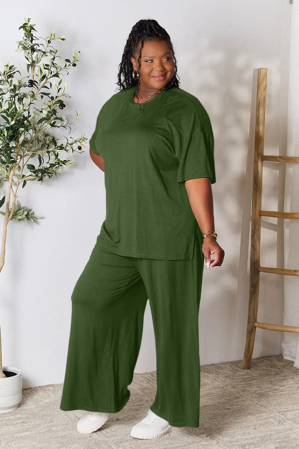 Hot pink double take full size round neck slit top and pants set by Trendsi, featuring a stylish coordinated outfit.