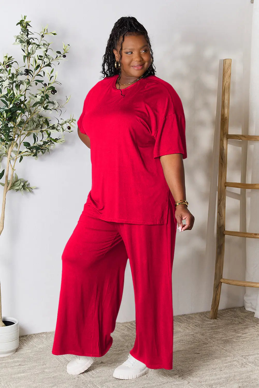 Trendsi hot pink double take full-size round neck slit top and matching pants set, casual and stylish outfit for women.