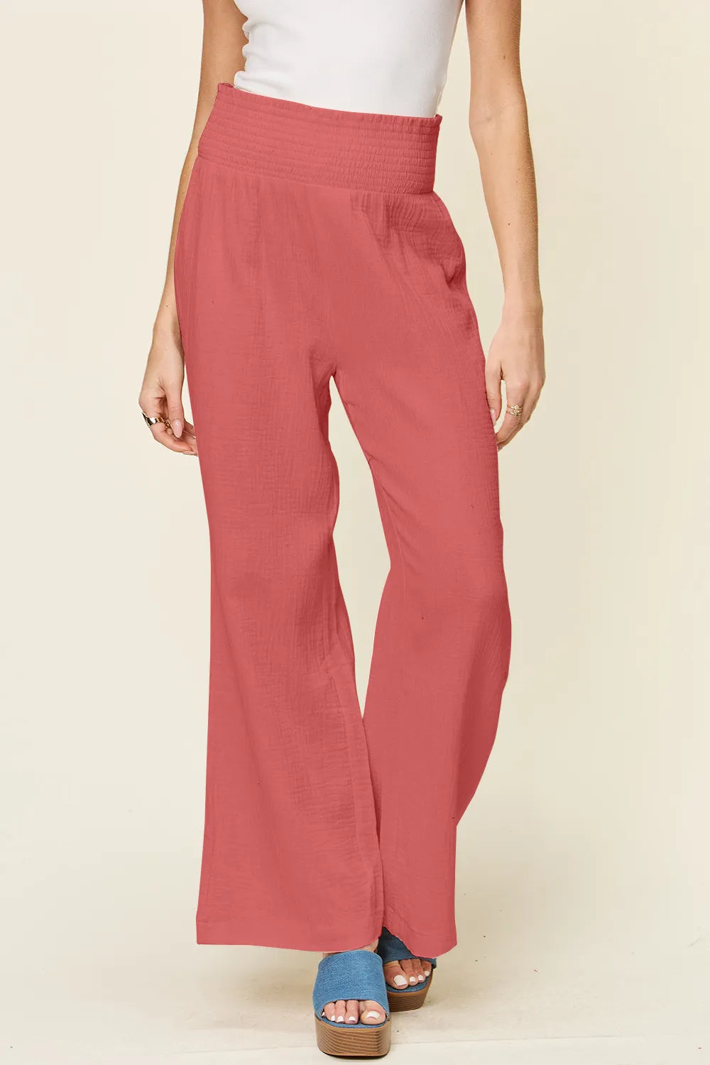 Hot pink Trendsi Double Take full-size textured wide-leg pants with smocked waist and relaxed fit.