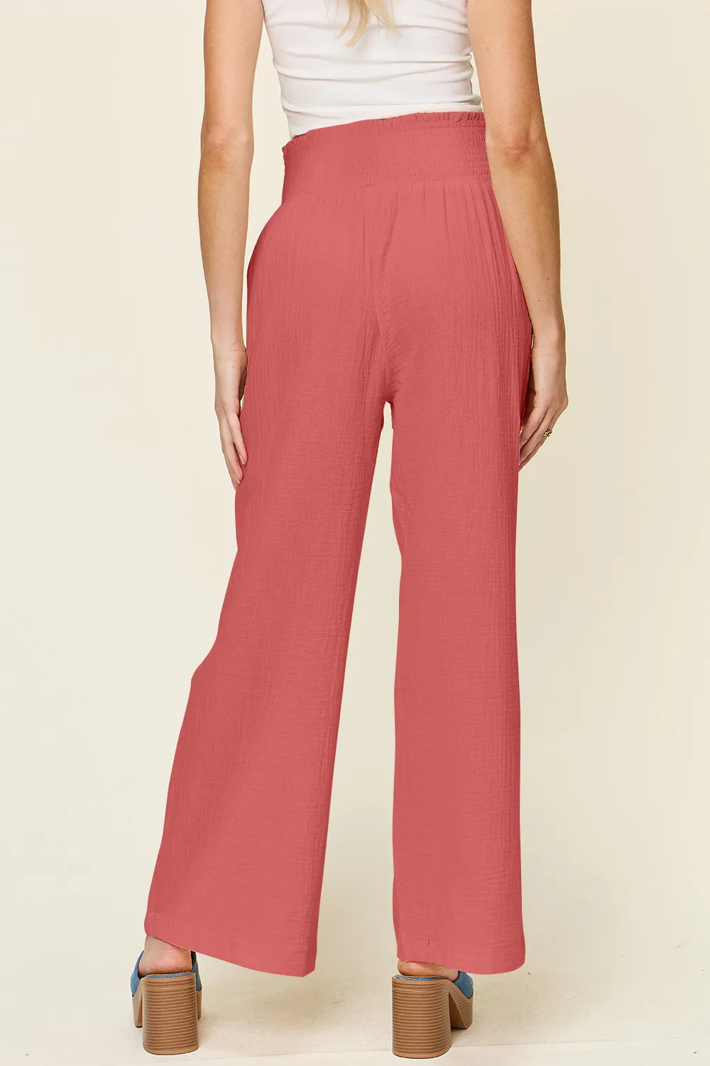 Hot pink double take wide leg pants with textured fabric and smocked waist from Trendsi, full size available.