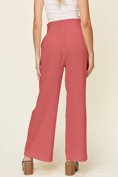 Hot pink double take wide leg pants with textured fabric and smocked waist from Trendsi, full size available.