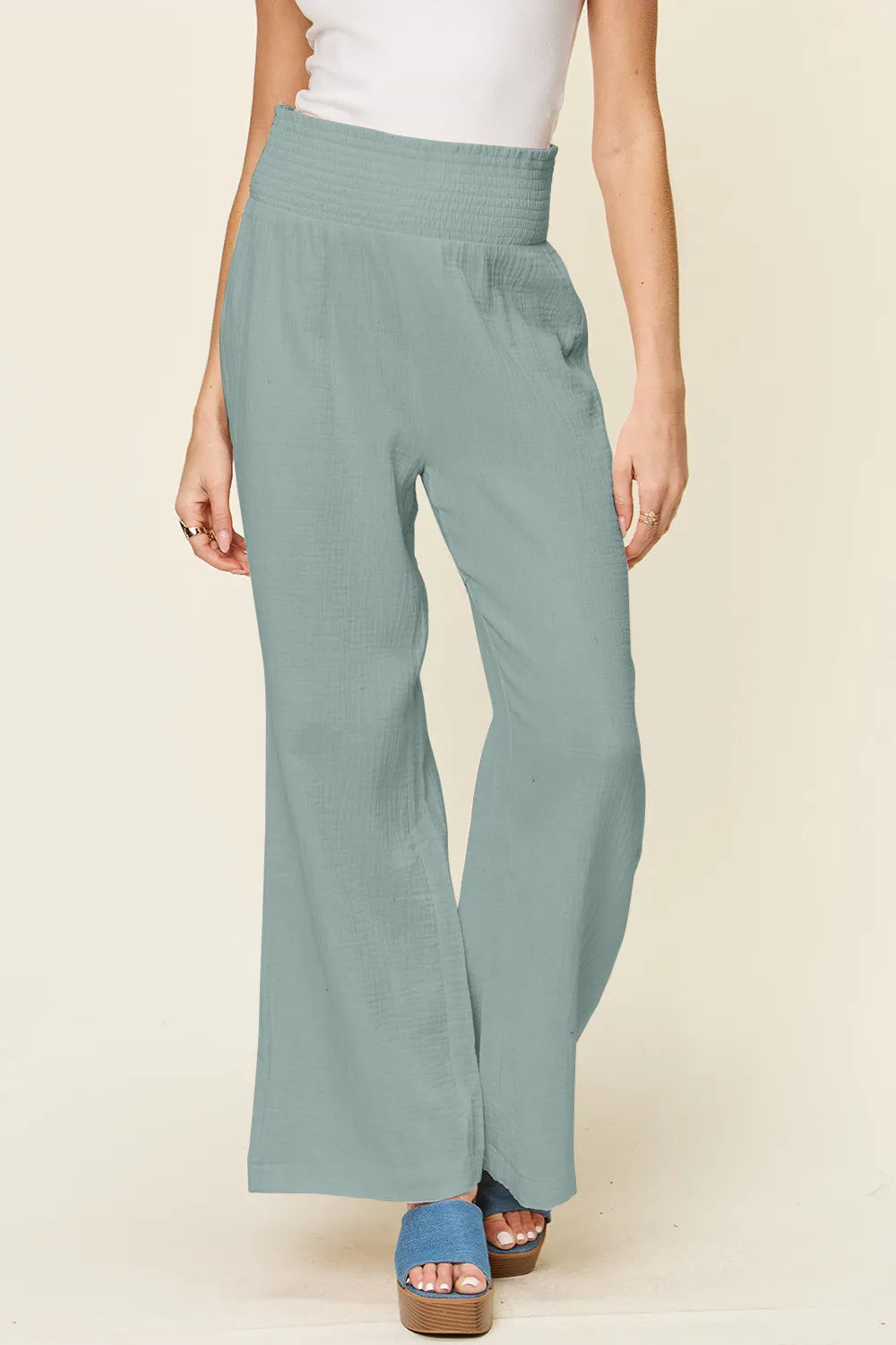 Hot pink Trendsi double take full size wide leg pants with textured fabric and smocked waist, stylish and comfortable.