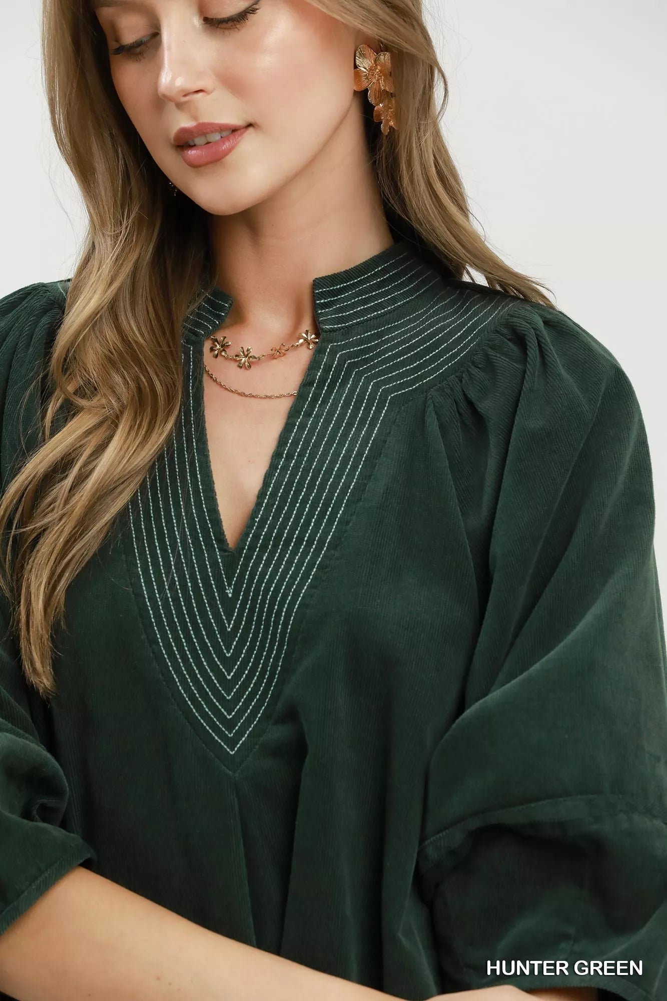 Hunter green Umgee corduroy V-neck puff sleeve shift dress with pockets, stylish and comfortable for casual wear.
