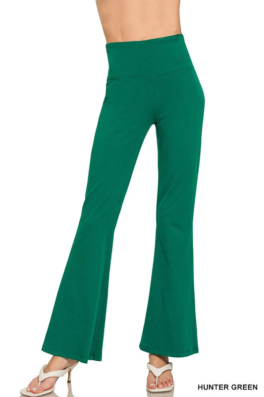 Hunter green Zenana wide waistband yoga flare pants from Trendsi displayed on a model, showcasing comfortable, stylish activewear.