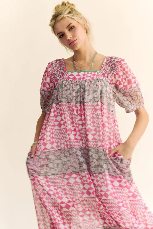 Davi & Dani multi-floral square neck puff sleeve maxi dress with Indian pink color and flowing silhouette.