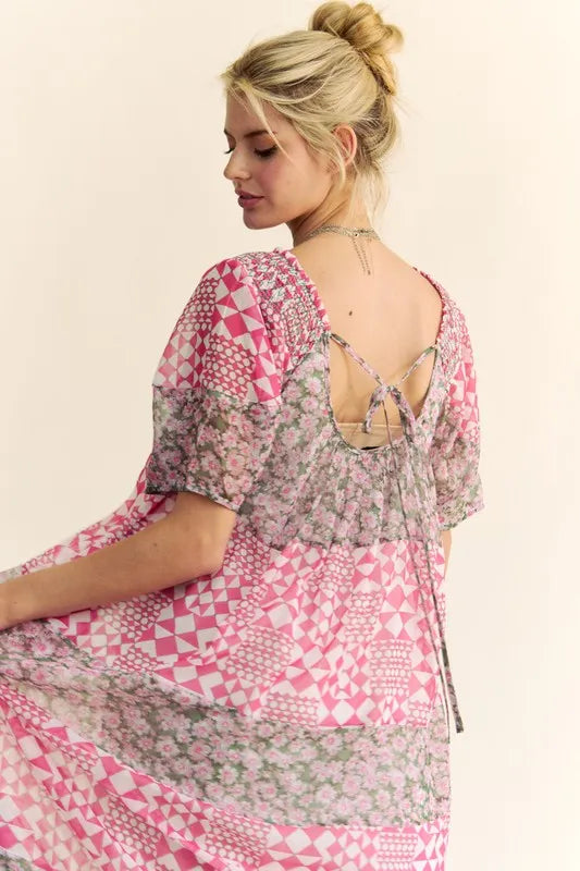 Davi & Dani multi-floral square neck puff sleeve maxi dress in Indian pink with a flowing silhouette and floral pattern.