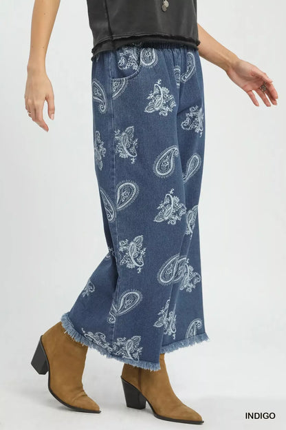 Indigo Umgee denim wide-leg pants with paisley pattern, relaxed fit and stylish design, perfect for casual wear.