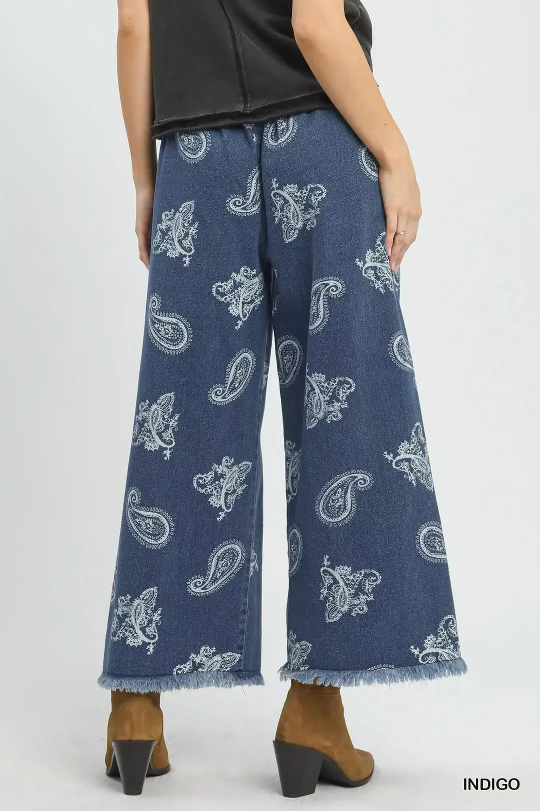 Indigo denim wide-leg pants with paisley pattern from Umgee, featuring a relaxed fit and stylish design.