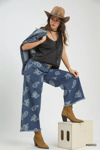 Indigo Umgee denim wide-leg pants with a paisley pattern, relaxed fit, and high waist, styled for casual wear.