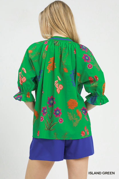 Island green floral split neck puff sleeve top by Umgee, featuring a relaxed fit and feminine design.