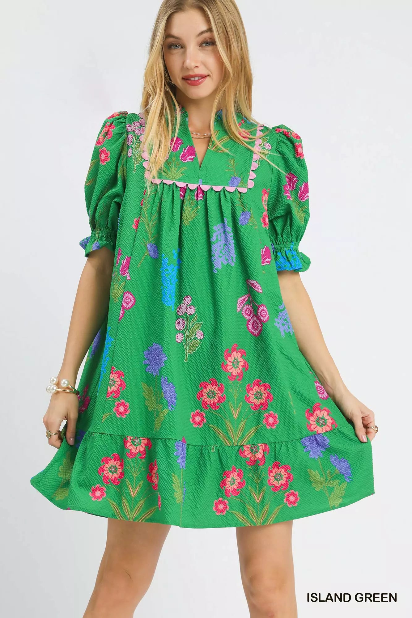 Umgee multi-flower print V-neck dress in island green, featuring a stylish and flowy design with vibrant floral patterns.