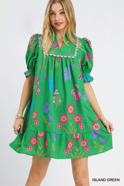 Umgee multi-flower print V-neck dress in island green, featuring a stylish and flowy design with vibrant floral patterns.