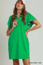 Island green Umgee mini dress with half-zip, ruffle rib band, butterfly sleeves, and pockets, styled for a casual look.