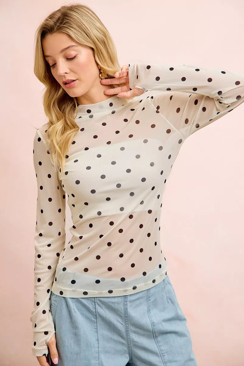 Ivory and black BiBi high neck mesh top with polka dots and thumb open design, stylish Trendsi women's fashion top.
