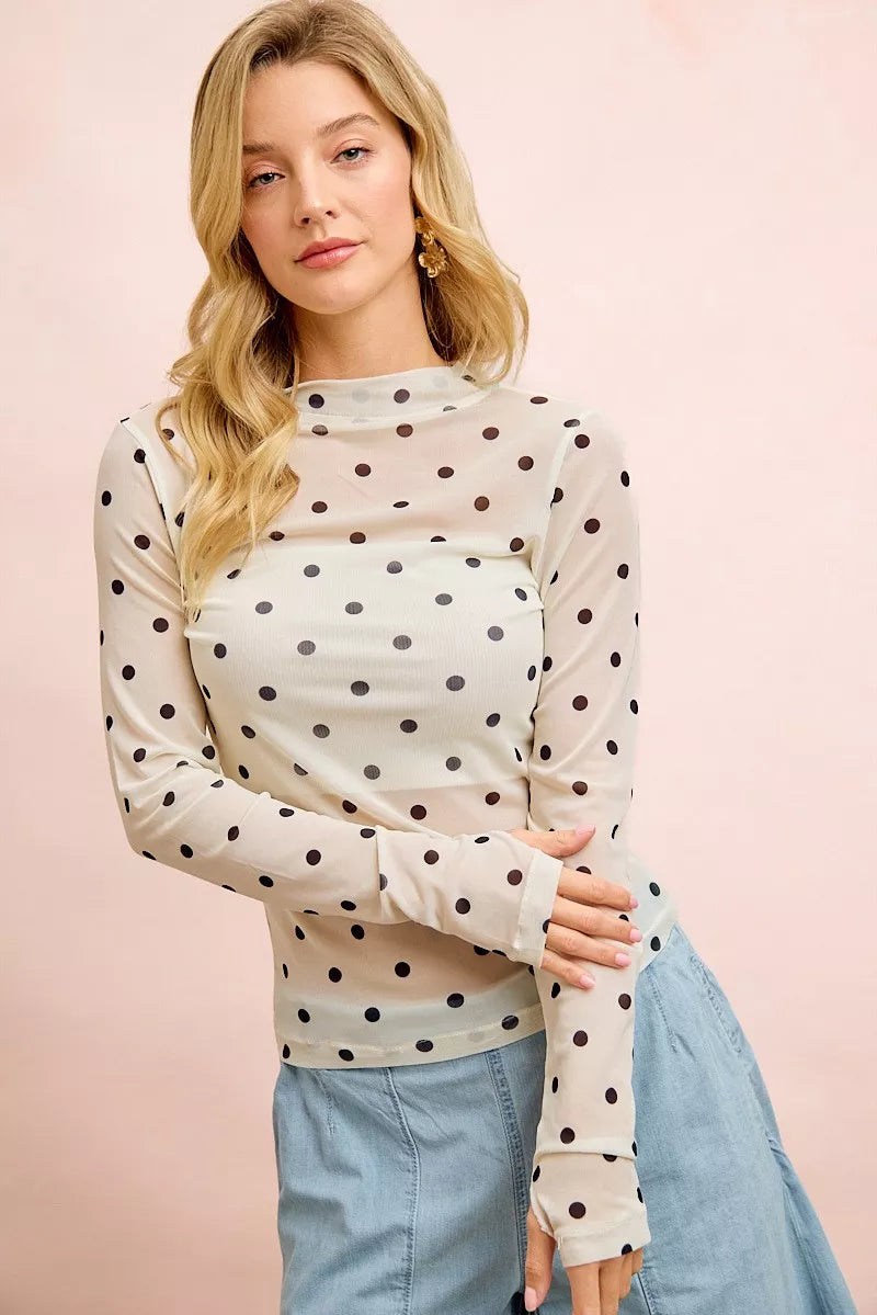 Ivory and black BiBi high neck mesh top with polka dots and thumb-open sleeves, stylish Trendsi women’s fashion blouse.