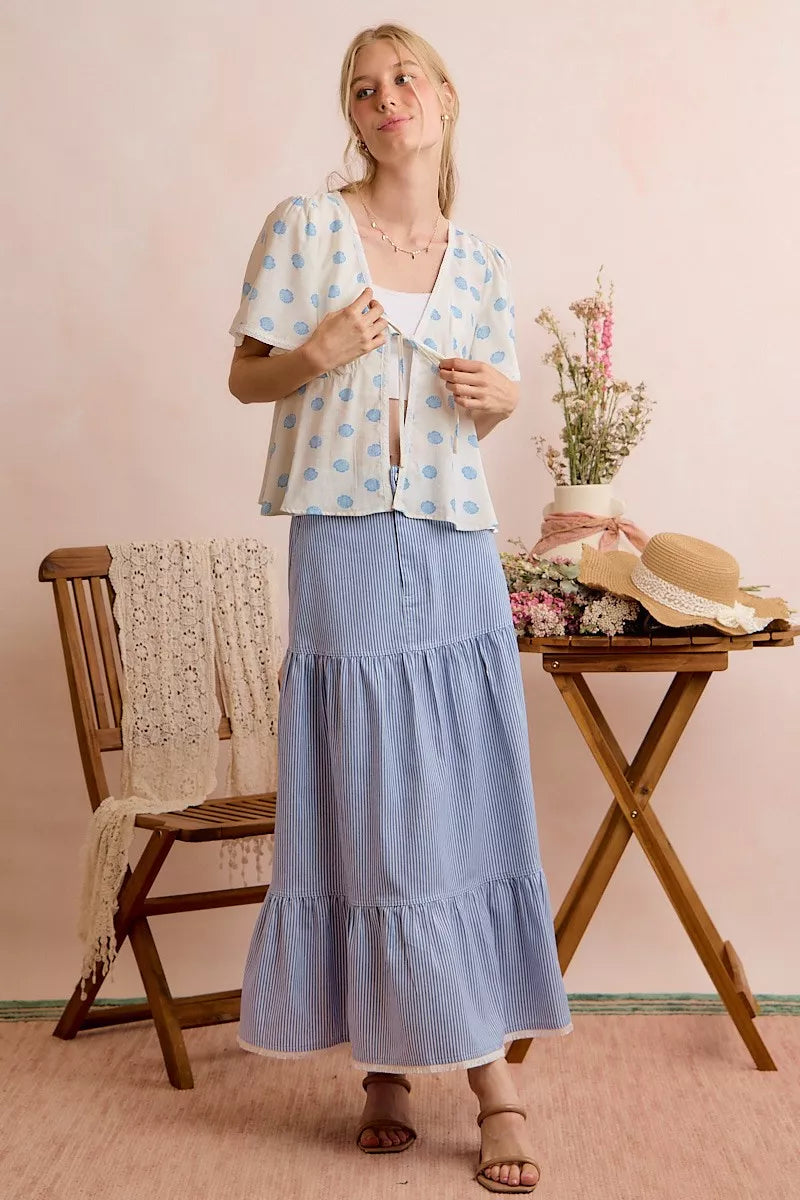 Ivory and blue SO ME shell print tie-front blouse with flutter sleeves, by Trendsi. Elegant and lightweight top for casual or dressy wear.