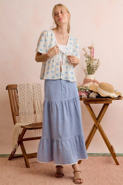 Ivory and blue SO ME shell print tie-front blouse with flutter sleeves, by Trendsi. Elegant and lightweight top for casual or dressy wear.