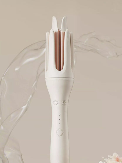 Trendsi automatic rotating ceramic curling iron in ivory with European plug, showcasing its ergonomic design and rotating barrel.
