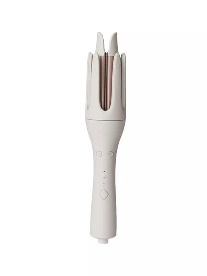 Automatic rotating ceramic curling iron by Trendsi with ivory finish and European plug, designed for creating smooth, styled curls.