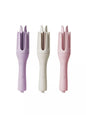 Trendsi automatic rotating ceramic curling iron with ivory finish and European plug for creating curling hairstyles.