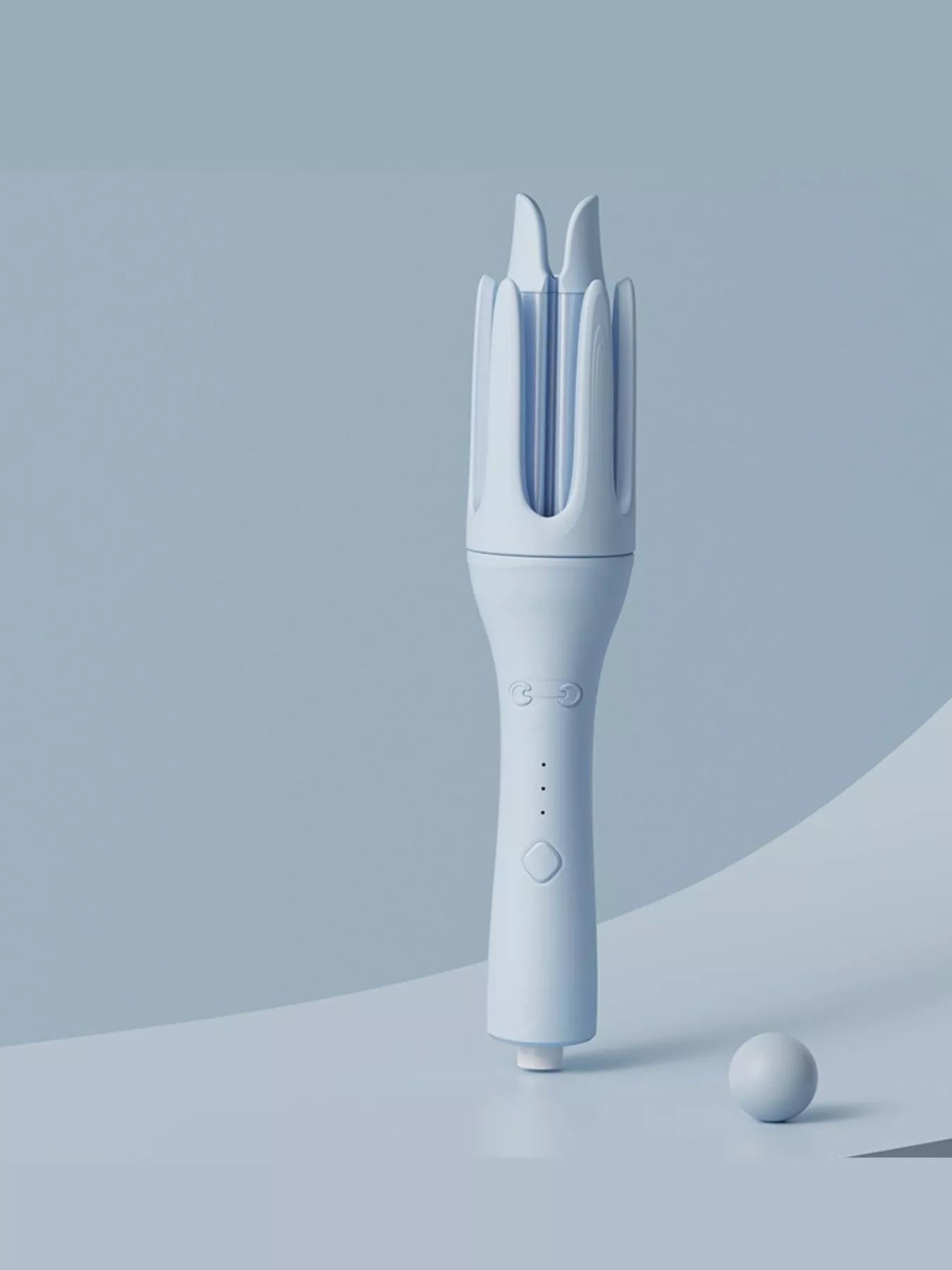 Trendsi ivory automatic rotating ceramic curling iron with European plug, showcasing its sleek design and rotating barrel.