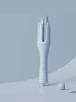 Trendsi ivory automatic rotating ceramic curling iron with European plug, showcasing its sleek design and rotating barrel.