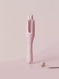 Trendsi automatic rotating ceramic curling iron with ivory finish and European plug for effortless, even curls.
