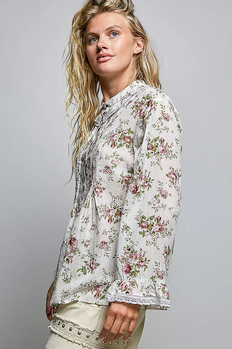 Ivory floral lace trim pintuck button-down shirt by Trendsi, with delicate lace details and classic fit, shown on a model.