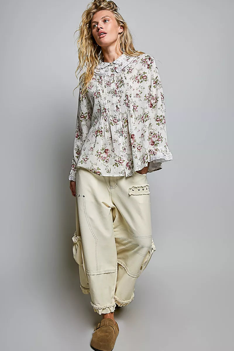 Ivory floral lace trim pintuck button-down shirt by Trendsi, featuring delicate lace accents and a classic tailored fit.