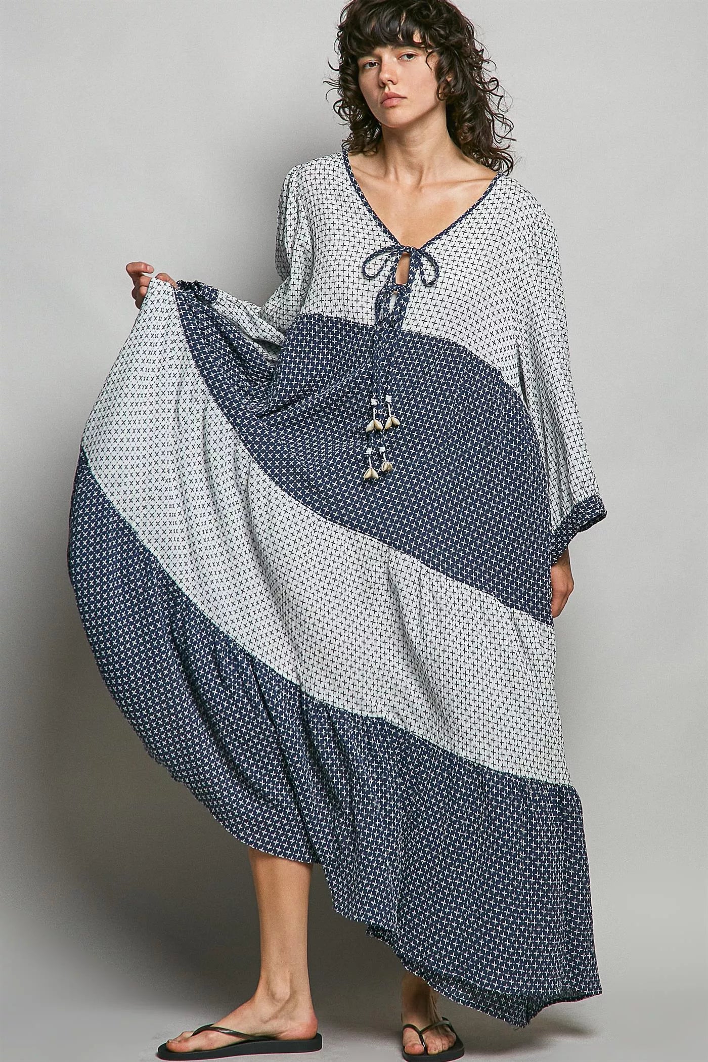 Ivory and indigo POL tiered boho maxi dress by Trendsi, featuring a two-tone design with flowing layers and bohemian style.