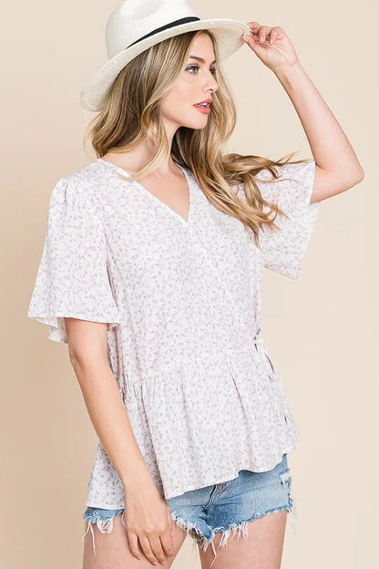 Ivory and lavender Lime 'N' Chili ditsy print V-neck wrap blouse with short sleeves by Trendsi, featuring a stylish and feminine design.