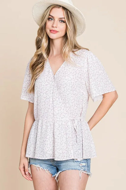 Ivory and lavender Lime 'N' Chili ditsy print V-neck short sleeve wrap blouse by Trendsi, featuring a stylish floral pattern.