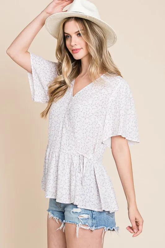 Ivory and lavender Lime 'N' Chili ditsy print V-neck short sleeve wrap blouse by Trendsi, featuring a stylish and feminine design.