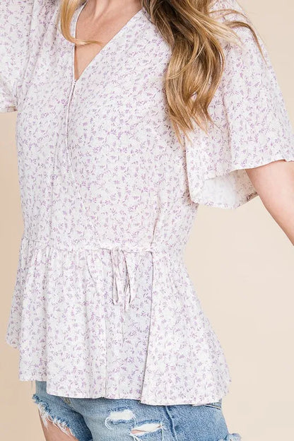 Ivory and lavender Lime 'N' Chili ditsy print V-neck short sleeve wrap blouse by Trendsi, with a relaxed fit and floral pattern.
