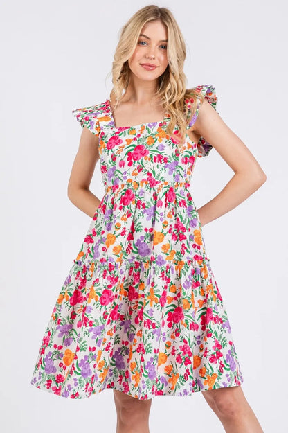 Ivory multi flower print ruffle shoulder A-line mini dress by Mittoshop, featuring a stylish floral pattern and flared silhouette.