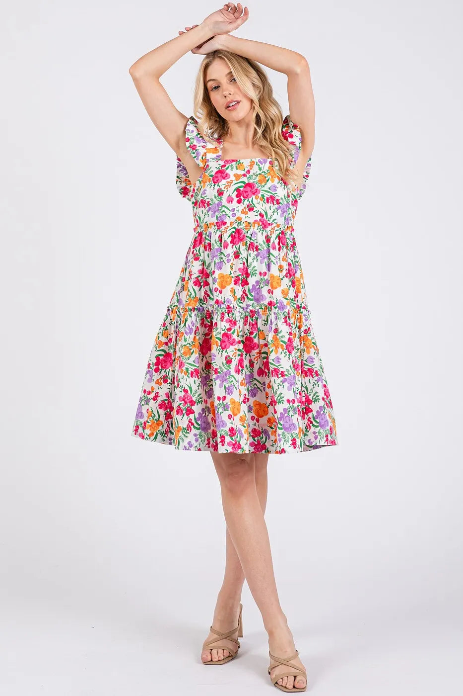 Ivory multi-color flower print ruffle shoulder A-line mini dress by Mittoshop, showcasing a feminine floral design and ruffled details.