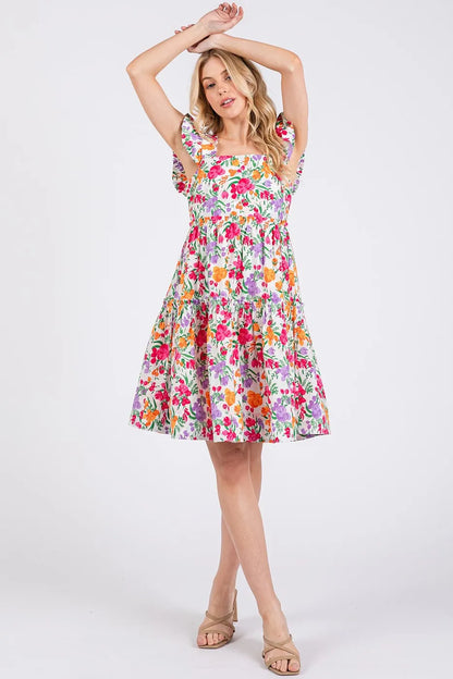 Ivory multi-color flower print ruffle shoulder A-line mini dress by Mittoshop, showcasing a feminine floral design and ruffled details.