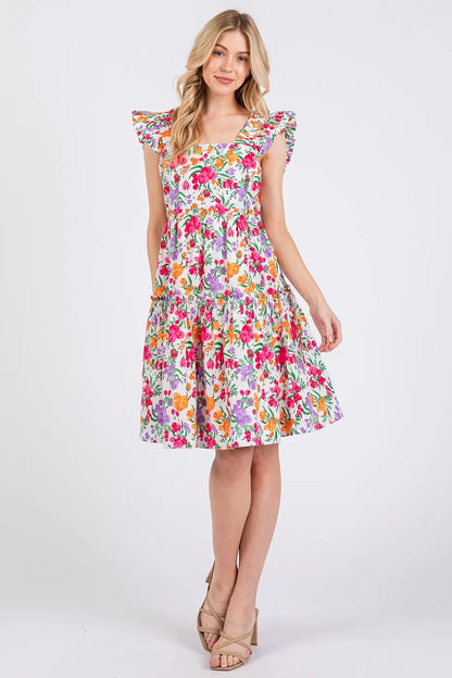 Ivory multi-color flower print ruffle shoulder A-line mini dress by Mittoshop, featuring a feminine floral design and ruffled details.