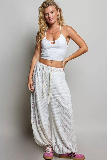 Trendsi ivory multi-color patchwork knit wide-leg pants with a relaxed fit and stylish design.