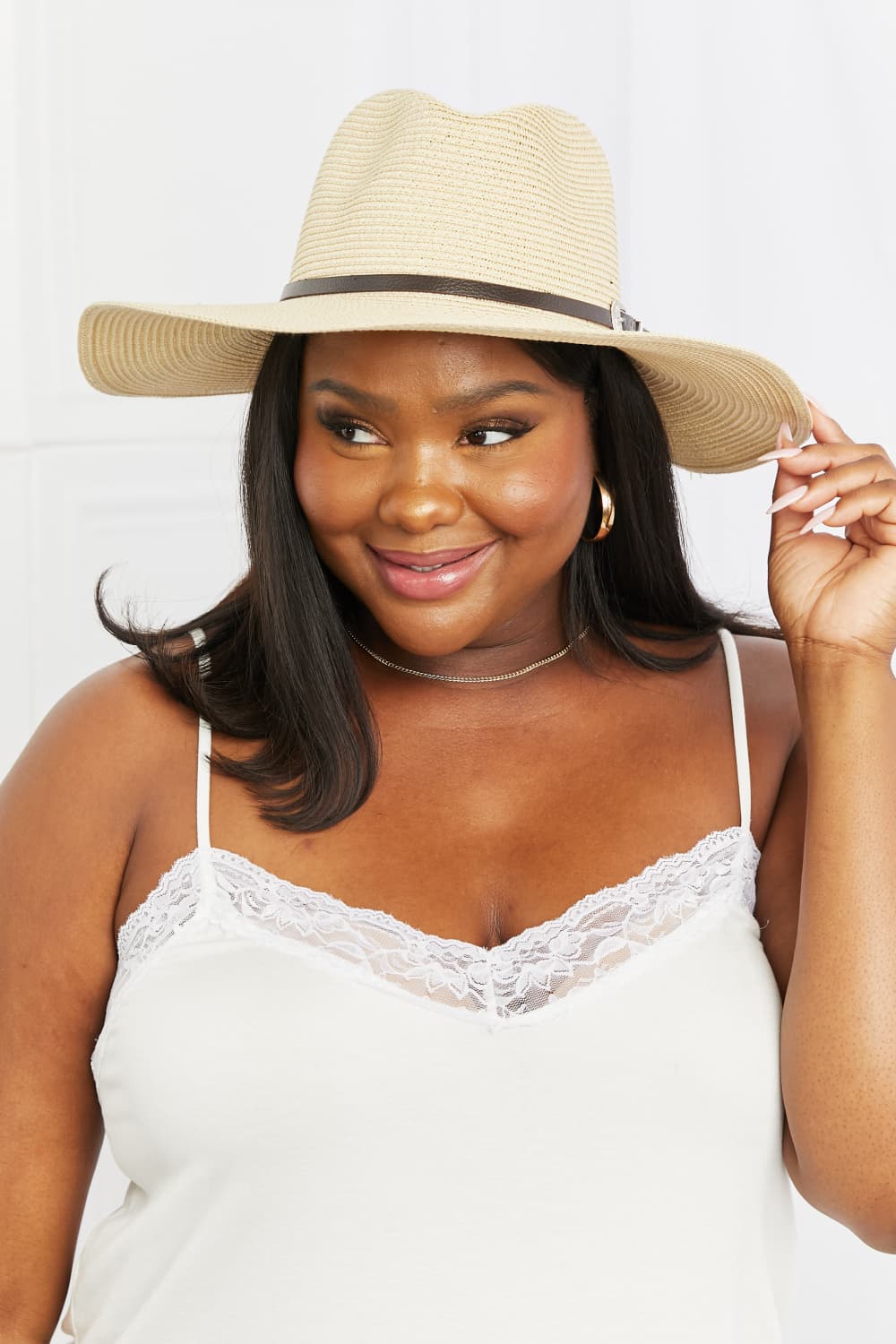 Ivory boho summer straw fedora hat by Trendsi with a wide brim, perfect for stylish sun protection and casual summer outfits.