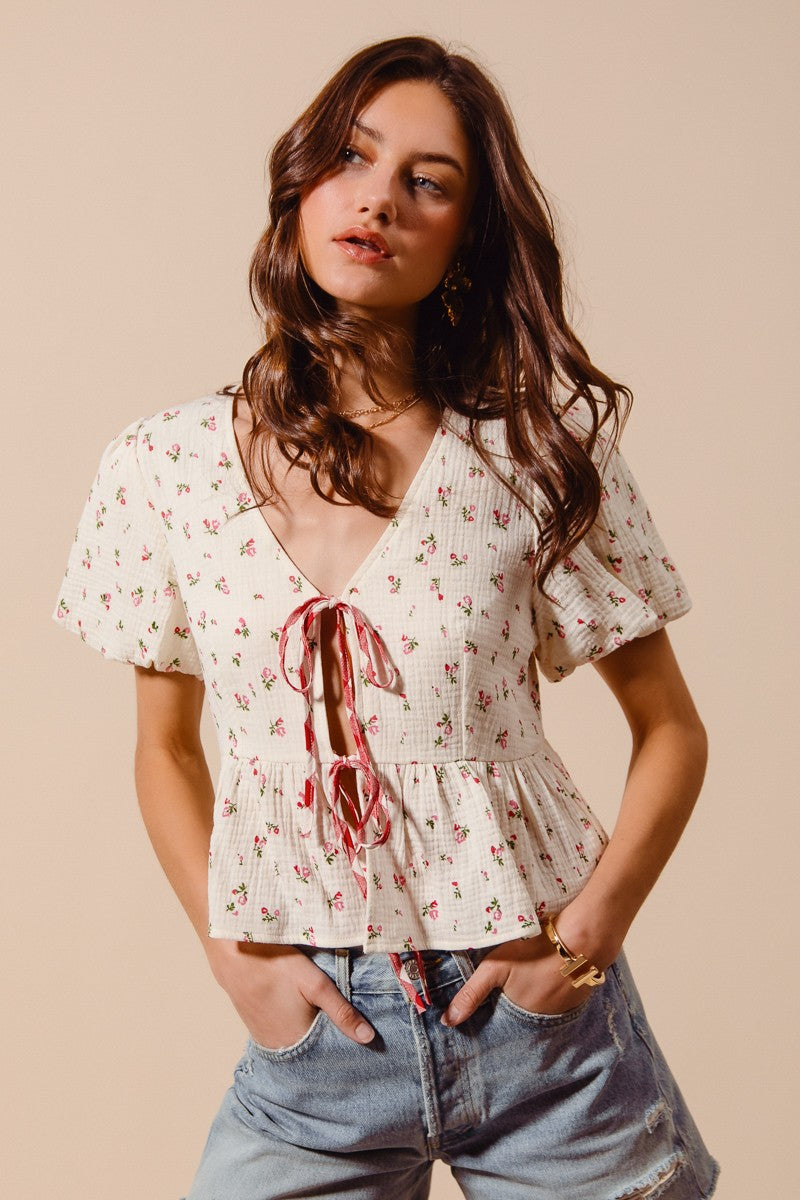 Ivory and red check SO ME Ditsy Floral Print Gauze Tie-Front Blouse by Trendsi, featuring a floral pattern and lightweight fabric.