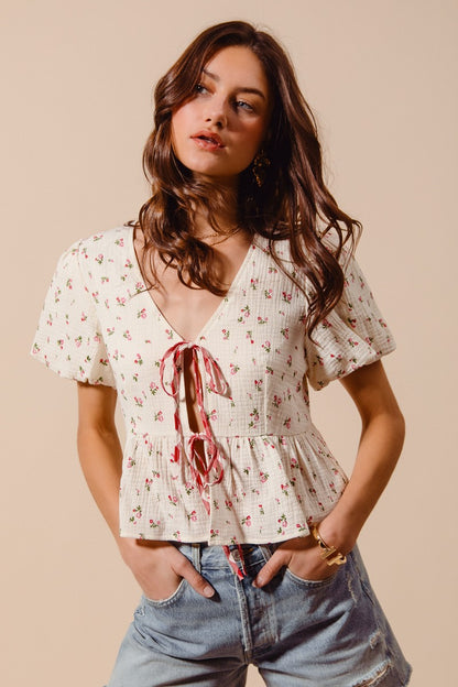 Ivory and red check SO ME Ditsy Floral Print Gauze Tie-Front Blouse by Trendsi, featuring a floral pattern and lightweight fabric.
