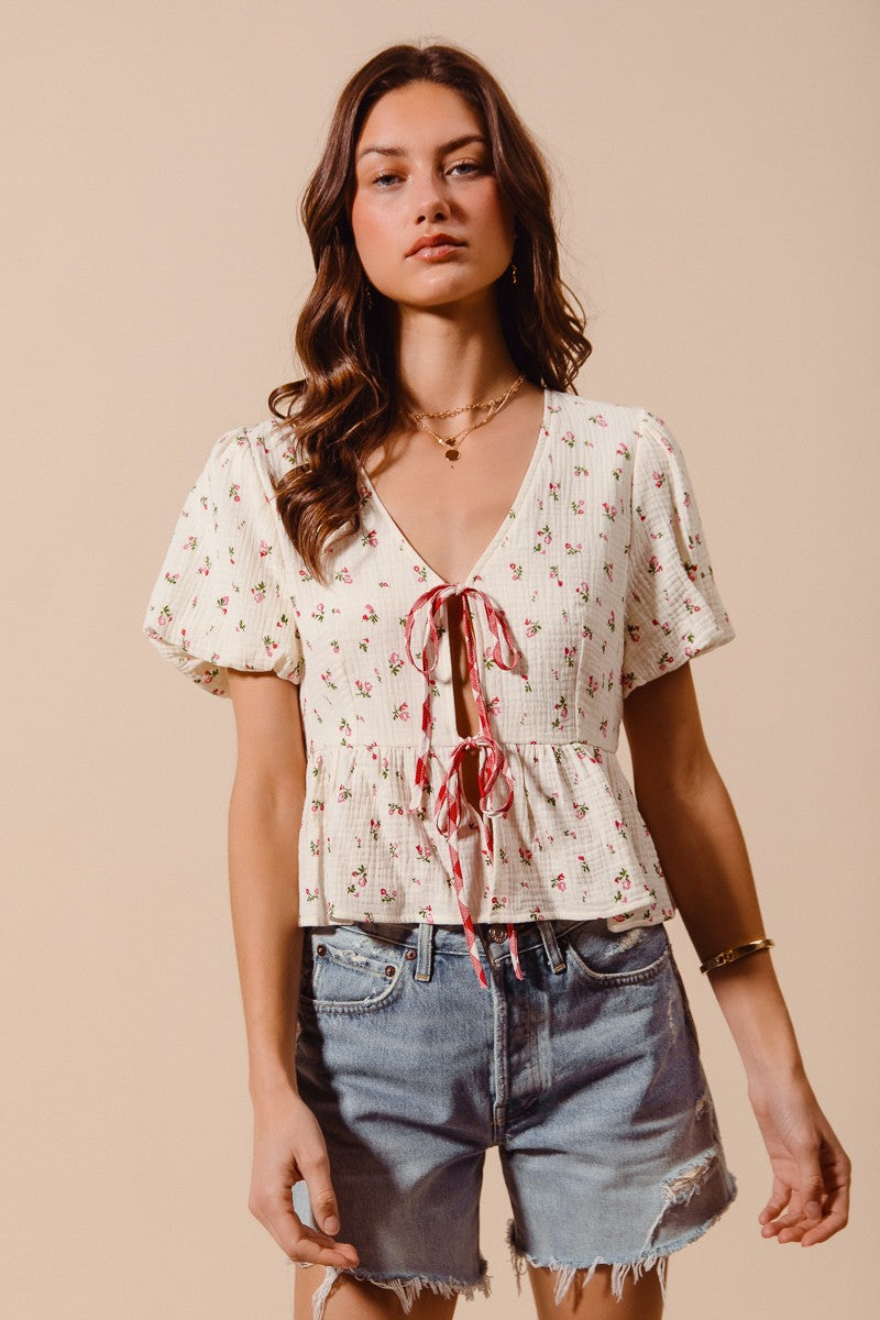 Ivory and red check ditsy floral print gauze blouse with tie-front from SO ME by Trendsi, shown on a model.