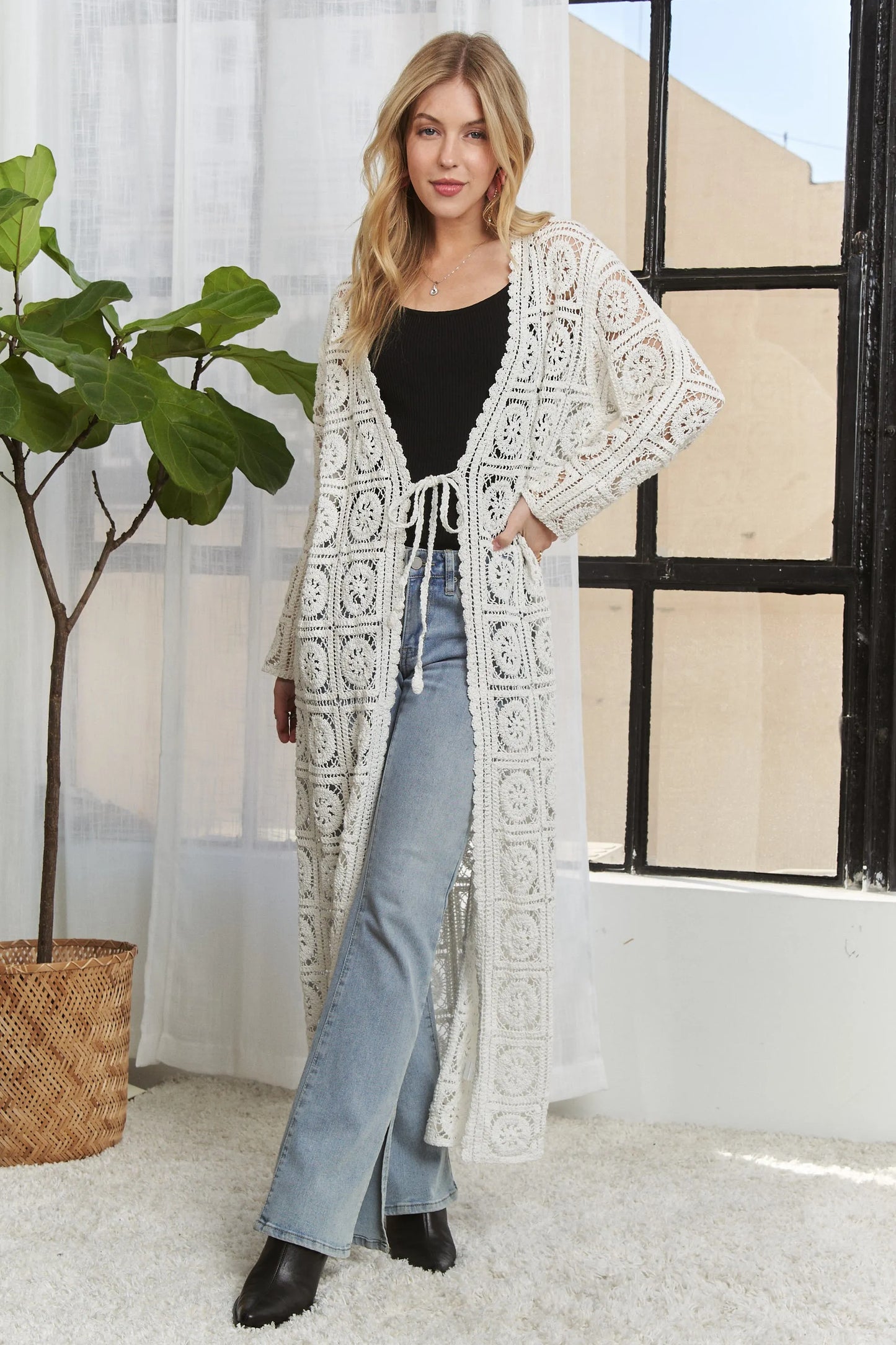 Ivory ADORA long sleeves crochet elastic cardigan by Trendsi, showing detailed knit pattern and fitted style.