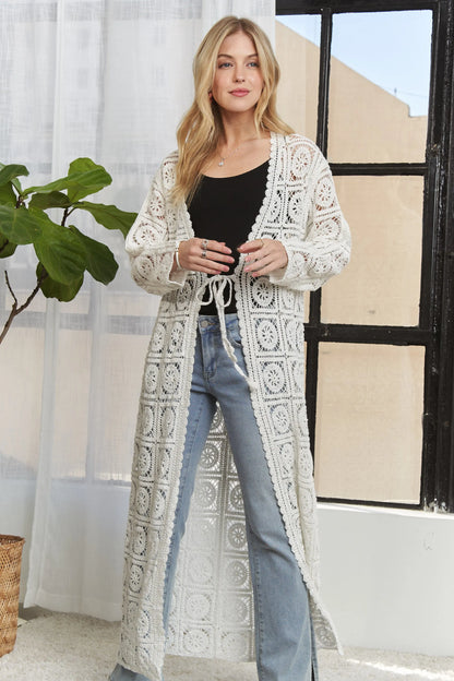 Ivory ADORA long sleeves crochet elastic cardigan by Trendsi, featuring a lightweight, textured crochet design with fitted long sleeves.