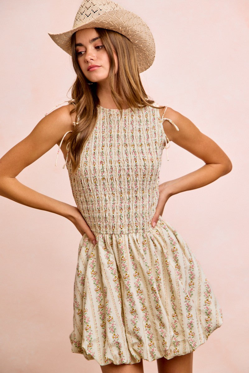 Ivory BiBi floral bow tie attachable puff sleeves dress by Trendsi, featuring a feminine floral pattern and elegant puff sleeve design.