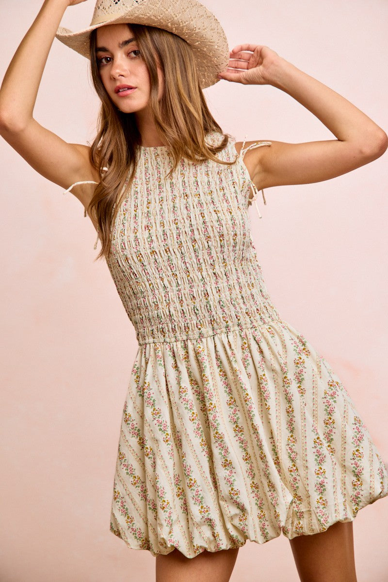 Ivory BiBi floral bow tie attachable puff sleeves dress by Trendsi, featuring a feminine floral pattern and elegant puff sleeves.