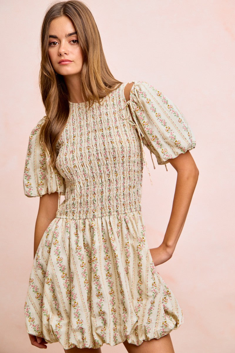 Ivory floral bow tie attachable puff sleeves dress by Trendsi, featuring a feminine design with puff sleeves and floral pattern.